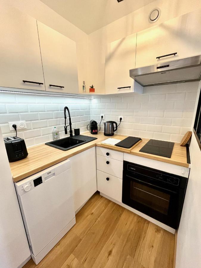 Studio Avec Grande Terrasse Et Parking Privatifs ก็อง ภายนอก รูปภาพ